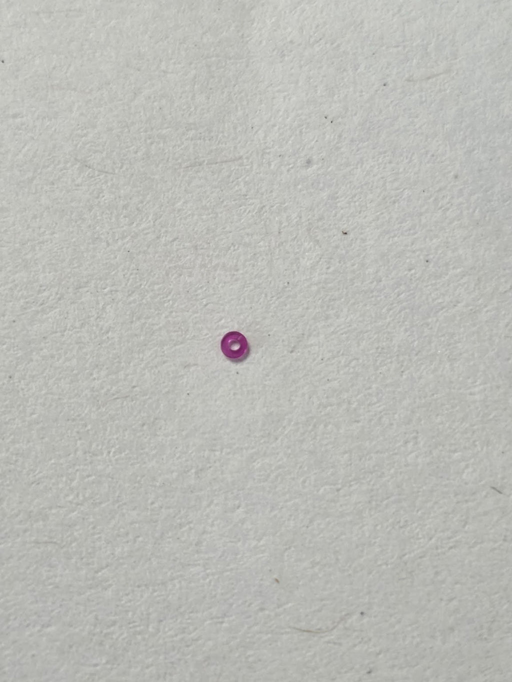 Rubis / pierre de centre d'origine sous papier de soie (dim. 77/120) - HS (H. Sandoz & Fils / Henschoz SA) - HSP 75 / Pierre de centre (77/120)